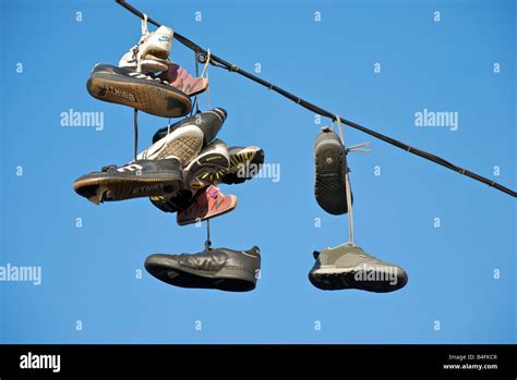 trainers hanging on wires